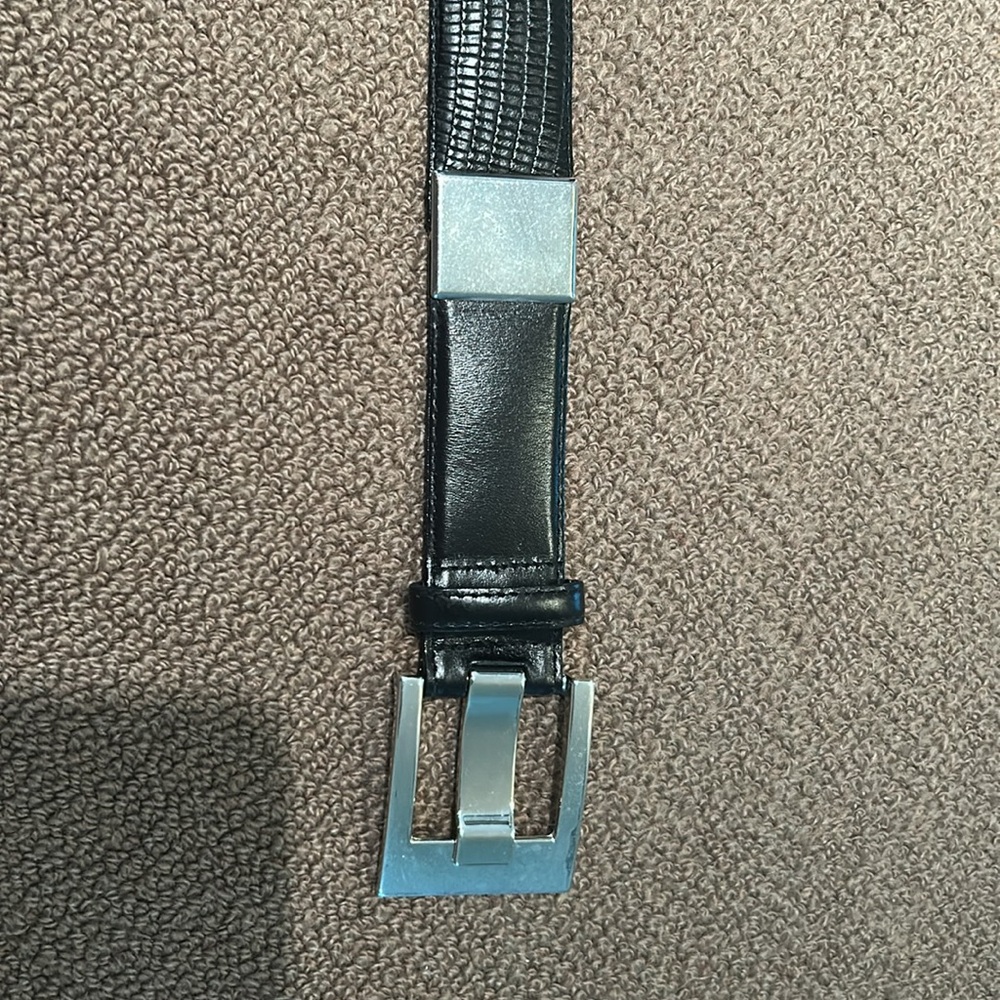Carlisle collection black leather belt with embossed snakeskin look.